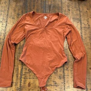 SKIMS Long Sleeve Bodysuit in Rust